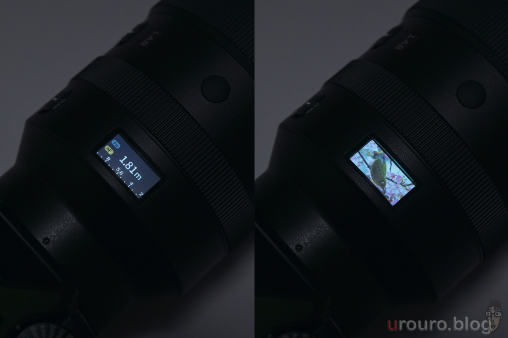 Viltrox AF 135mm F1.8 LAB のデジタル測距窓は、通電したタイミングでメジロが顔を出す遊び心がある。